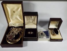 A small collection of jewellery stamped '925' and '800' and a gold plated necklace.