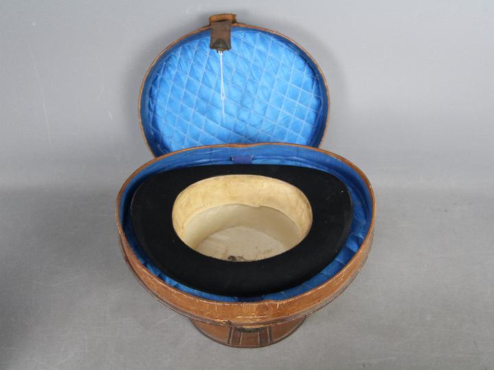 A leather top hat box containing a T Crick, Bury top hat, - Image 8 of 8