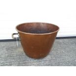 A large copper and brass preserving pan with twin handles, approximately 33 cm (h) x 47 cm (d).