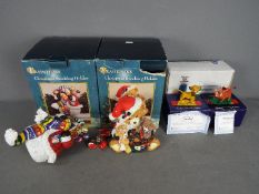 Two boxed Christmas Stocking Holders and two boxed Disney 'The Lion King' ornaments.