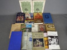 A quantity of books and publications to include first editions of The Tribe That Lost Its Head,