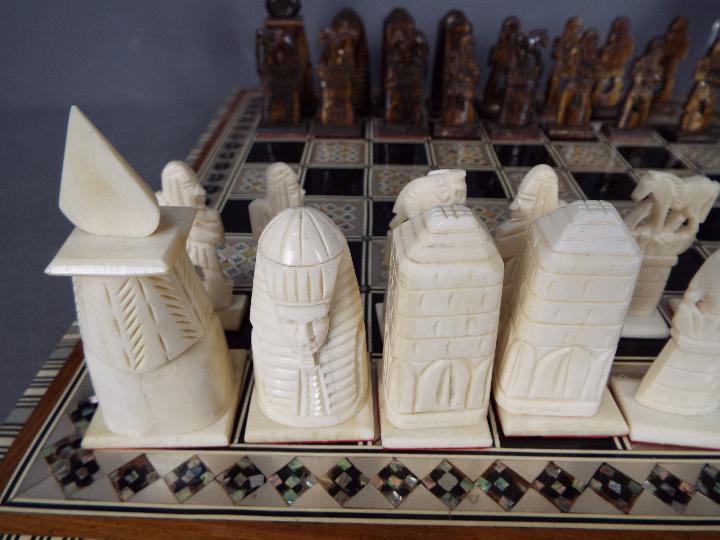 Two chess sets, one with Egyptian style pieces (10 cm king), - Image 4 of 4