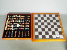 A 'Wizards and Dragons' chess set.