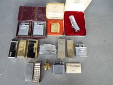A good collection of vintage cigarette lighters to include Ronson, Colibri,