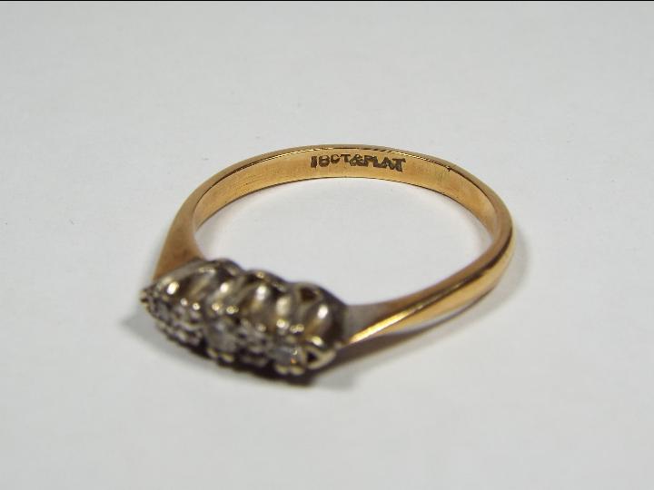 Triple stone set ring stamped 18ct & PLAT, size K½, - Image 4 of 4