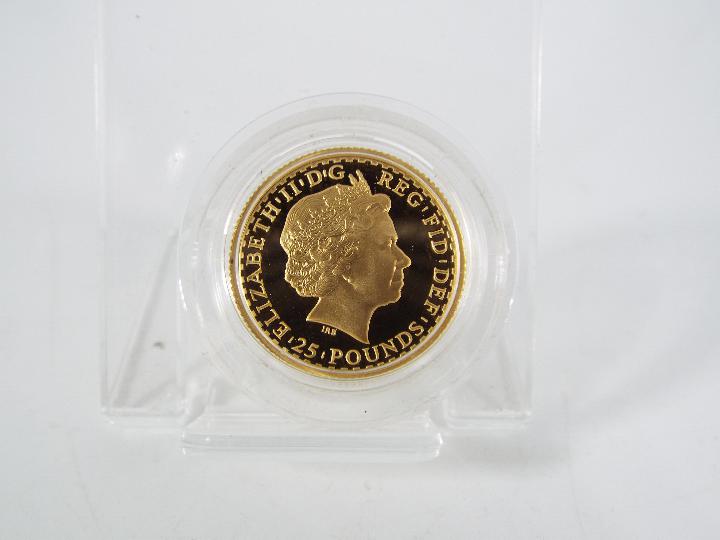 A 1999 ¼ Ounce Britannia gold proof coin (approximately 8. - Image 2 of 3