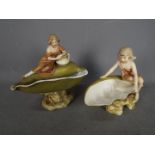 Royal Dux - Two figural shell centrepieces, largest approximately 19 cm (h).