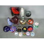 A collection of paperweights to include Caithness, Selkirk Glass, Strathearn, Mdina,