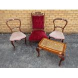Three chairs and a stool with cane seat.