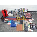 A pair of K2 skis, Salomon ski boots (size 8½), a quantity of DVD's,