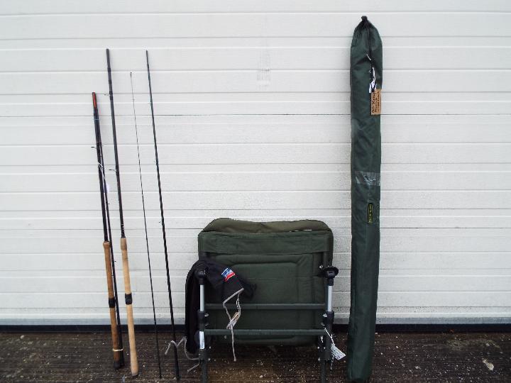 A folding chair, carp / freshwater fishing recliner seat,