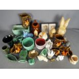 A collection of predominantly Sylvac ceramics to include animals, flora and fauna vases and similar.