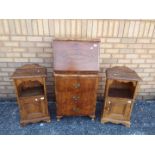 A small fall front bureau 106 cm x 53 cm x 40 cm and two bedside cabinets 74 cm x 38 cm x 26 cm.
