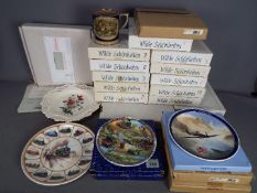 A quantity of collector plates and a commemorative 1851 Great Exhibition mug.