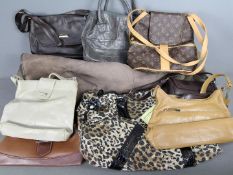 A quantity of handbags and a Taube Collection sheepskin coat, size 18.