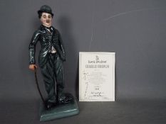 Royal Doulton - A limited edition figurine depicting Charlie Chaplin # HN2771,