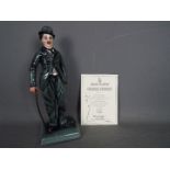 Royal Doulton - A limited edition figurine depicting Charlie Chaplin # HN2771,