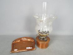 A Hinks & Sons oil lamp, 39 cm (h) and a Joseph Sankey copper crumb tray.