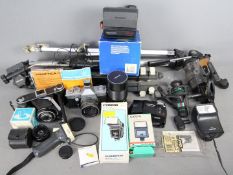 Photography - A collection of cameras and accessories to include a Praktica LTL3, Polaroid,