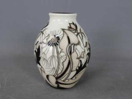 Moorcroft - a Moorcroft vase in the Timeless pattern,