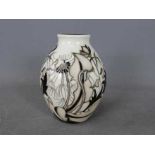 Moorcroft - a Moorcroft vase in the Timeless pattern,