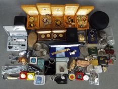 A mixed lot of collectables to include 9ct gold filled sovereign case, scent bottle, keyrings,