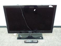 A Samsung 32" flatscreen television, model UE32C5100 with remote.