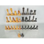 A complete chess set, pieces with weighted bases,