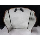 A triptych dressing table mirror with bevelled glass, approximately 82 cm x 97 cm when fully open.