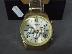 An Akribos XXIV gentleman's wristwatch in original box.