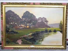 A large framed oil on canvas landscape scene depicting grazing cattle,