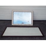 Two wood framed, bevel edged wall mirrors, largest approximately 128 cm x 44 cm.