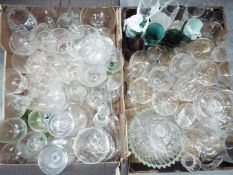 Two boxes of mixed glassware.