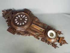 A Late 19th century decorative cartel style wall clock compendium,