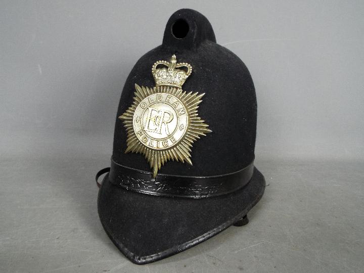 Vintage Oldham Police helmet.