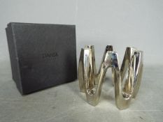 A Dansk nickel plated 'Crown' taper candle holder, contained in original box.