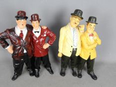Two large Laurel & Hardy figurines, approximately 35 cm (h).