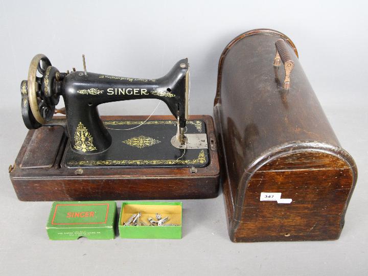 A Singer F Series sewing machine circa 1910, contained in case.