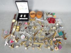 Lot to include cufflinks, tie pins, pin badges, silver hallmarked gentleman's ring, size W+½,
