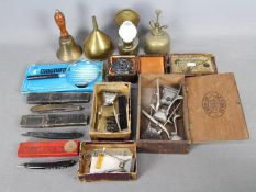 A mixed lot of collectables to include vintage hair clippers, cut throat razors, oil can,