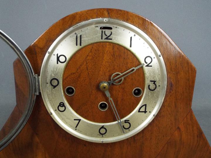 A mantel clock, Arabic numerals to a silvered chapter ring, with key and pendulum. - Image 2 of 6