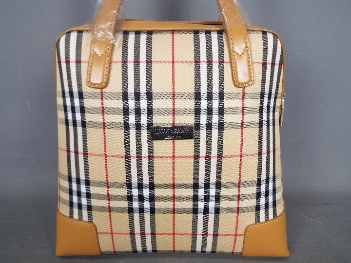 A Burberry Nova Check day bag. - Image 2 of 6