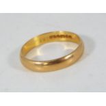 A 22ct gold wedding band, size P, approximately 3.2 grams all in.