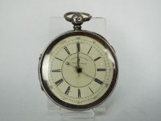 A silver chronograph pocket watch