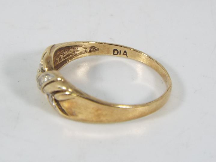 A 9ct gold and diamond set ring, size O, approximately 1.7 grams all in. - Image 5 of 5