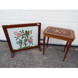 An inlaid side table with musical movement on sabre supports 56 cm x 50 cm x 37 cm and a wooden