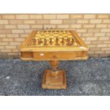 A chessboard table, approximately 66 cm