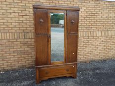 A wardrobe with mirror to the door exter