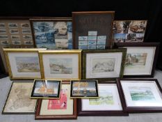 A collection of fourteen framed pictures