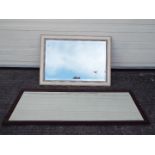 Two wood framed, bevel edged wall mirror